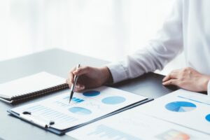 Businessman Accounting Calculating Cost Economic Financial data.