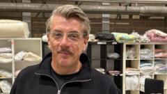 children-sleeping-on-piles-of-clothes,-says-charity